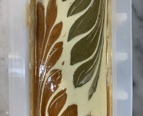 Freshly poured soap mix with autumn design, main colors brownish red & olive green